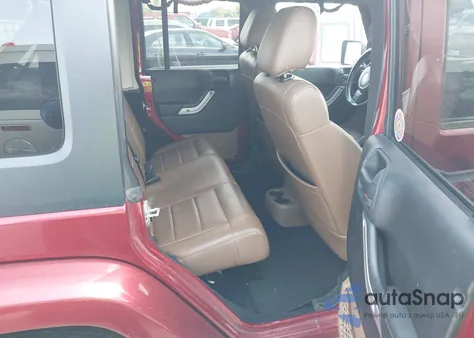 2012 Jeep Wrangler Unlimited Sahara z USA, uszkodzony, nr VIN 1C4BJWEG9CL110966